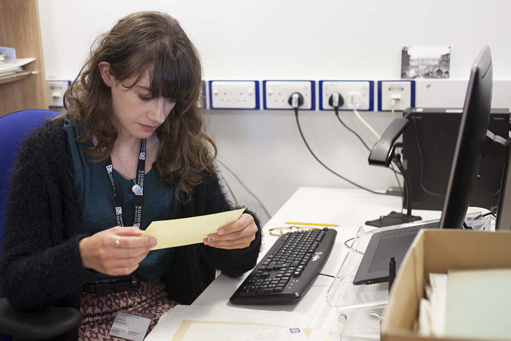 Evie Porat cataloguing part of the Penguin Archive, July 2017. Photograph by Jamie Carstairs.
