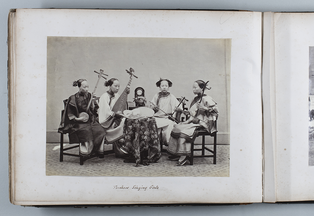 Four musicians (singers), with instruments, Fuzhou, c.1868-1874 (HPC ref Fr01-044). Photograph by Lai Fong (Afong Studio). A page from the John Gurney Fry album (DM2887).